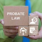 Lawyer holding wooden blocks with icons labeled 'Probate Law.' Represents probate processes involving wealth, property, and court decisions on inheritance.