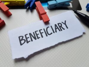 Beneficiary writing on white background