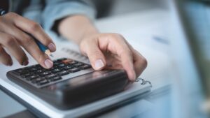 Person calculating probate cost