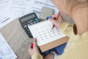 A lady noting deadline for compliance of CTA