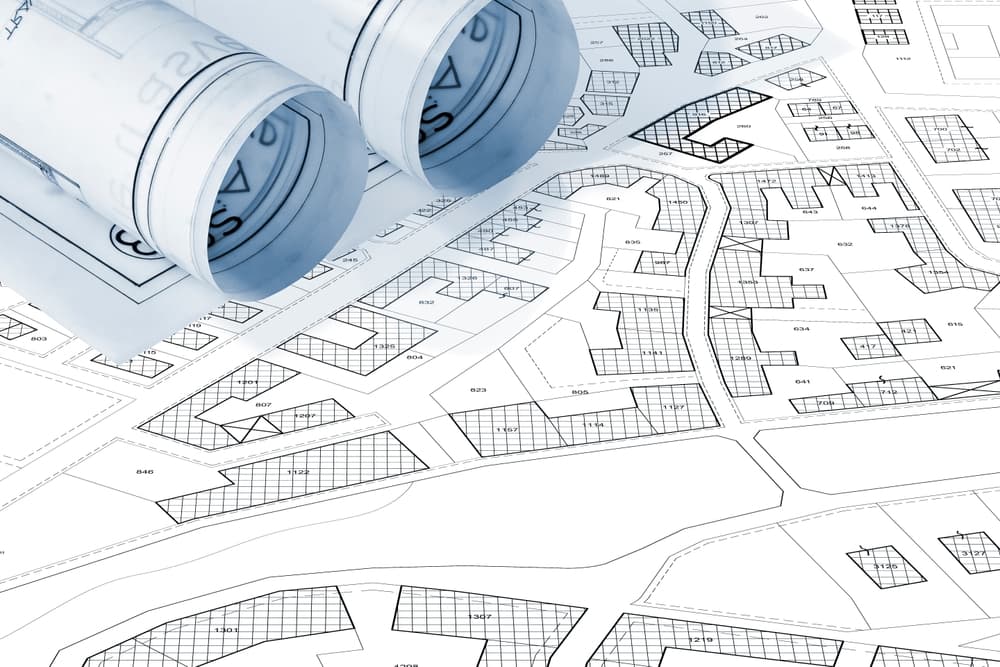 Map with buildings, land parcel and vacant plot - land records and property registry.